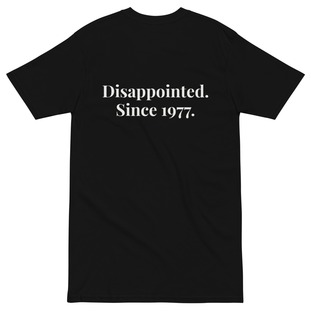 Back flat lay of the Disappointed Since 1977 heavyweight tee.