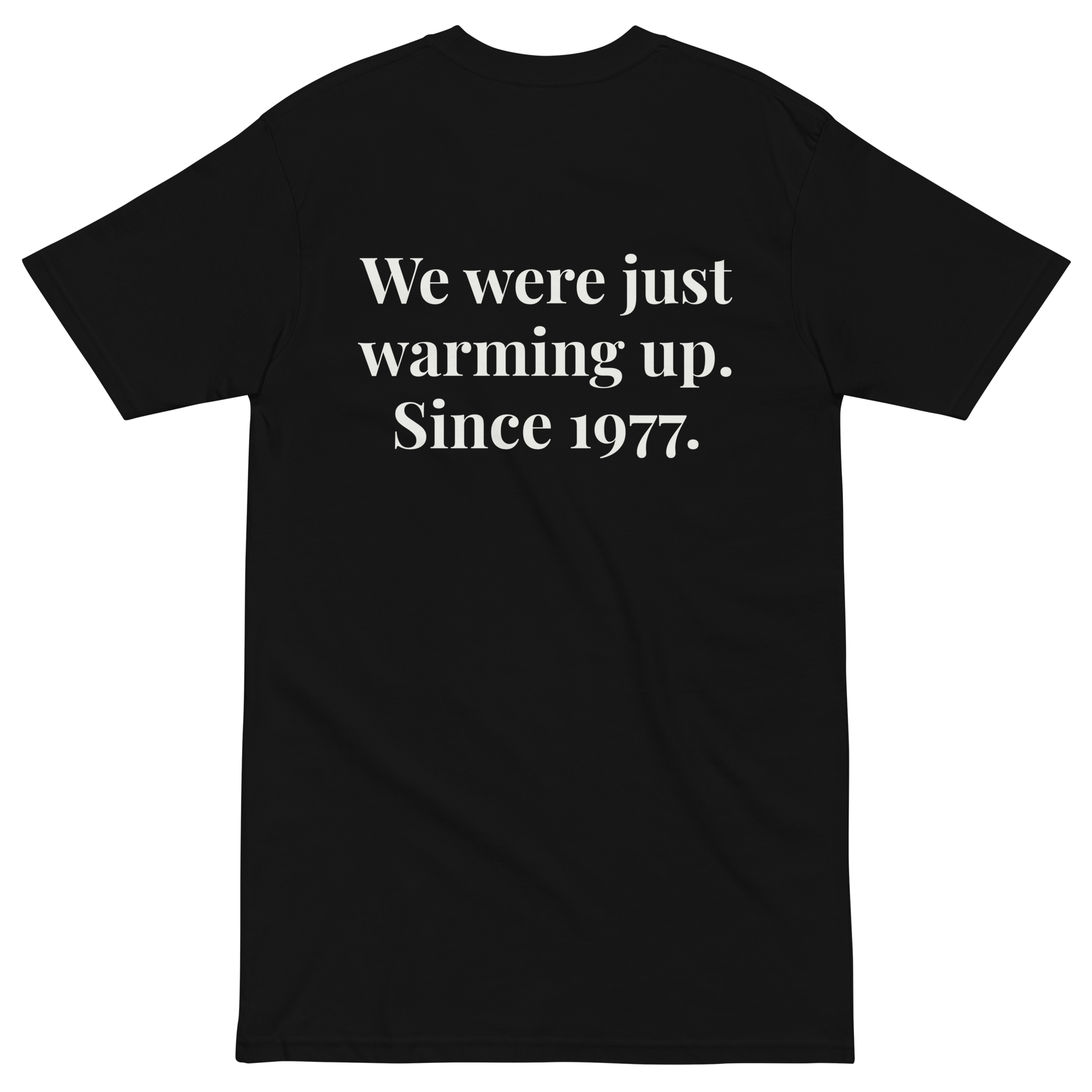 Back flat lay of the We were just warming up Since 1977 heavyweight tee.